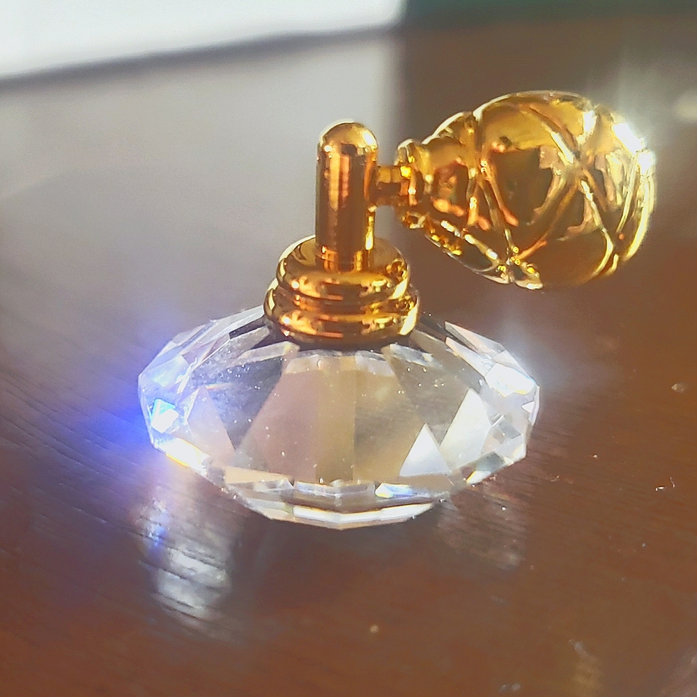 Retired Swavorski tiny decorative perfume bottle
